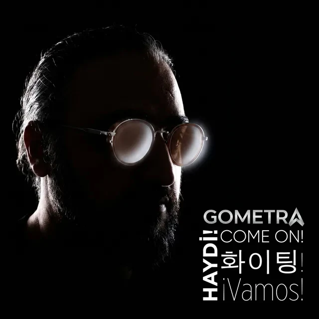 Haydi! EP cover: Gometra in glasses on a black background